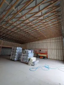 Spray foam equipment warming up before insulating 16000 square foot warehouse in Kalispell Montana